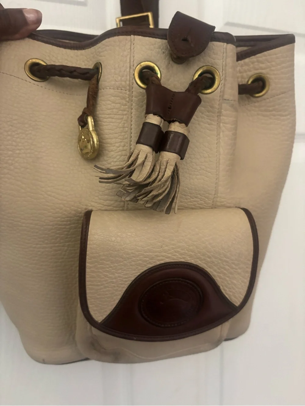 Dooney & Bourke Beige and Brown Leather Drawstring Bucket Backpack